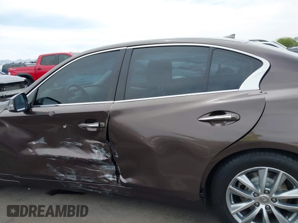 2015 Infiniti Q50 with VIN JN1BV7AP7FM349885, listed as a IAAI auction lot 42249063 with 76,089 mi miles and . Bid and sale history available at DreamBid. Image 14.