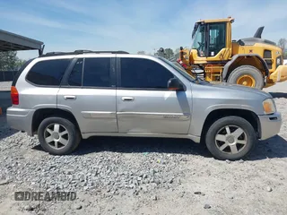 2005 GMC Envoy SLE with VIN 1GKDS13S652390259, listed as a IAAI auction lot 41825258 with 162,172 mi miles and . Bid and sale history available at DreamBid. Image 13.