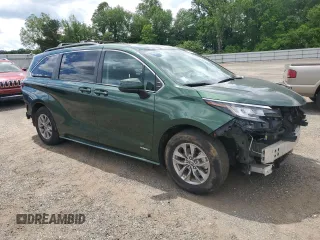 2021 Toyota Sienna LE with VIN 5TDBSKFC4MS027897, listed as a Copart auction lot 56052375 with 66,604 mi miles and Salvage title. Bid and sale history available at DreamBid. Image 4.