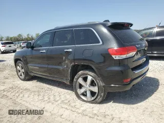 2015 Jeep Grand Cherokee High Altitude with VIN 1C4RJECGXFC906464, listed as a Copart auction lot 49657955 with 125,239 mi miles and Salvage Title. Bid and sale history available at carsss.com. Image 2.