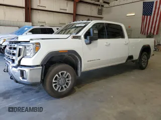 2021 GMC Sierra 1500 with VIN 1GT48ME7XMF253322, listed as a Copart auction lot 73474824 with 130,263 mi miles and Salvage Title. Bid and sale history available at DreamBid. Image 1.