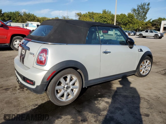 2013 MINI Convertible S with VIN WMWZP3C50DT550800, listed as a Copart auction lot 42409015 with 101,421 mi miles and Salvage title. Bid and sale history available at DreamBid. Image 3.
