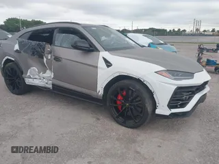 2019 Lamborghini Urus z VIN ZPBUA1ZL6KLA06025, wystawiony jako IAAI lot #41582035 z przebiegiem 71 842 mil mil oraz . Historia ofert i sprzedaży dostępna na DreamBid. Obrazek 1.
