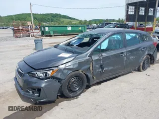 2018 Subaru Impreza with VIN 4S3GTAA60J3731249, listed as a IAAI auction lot 42294911 with 73,342 mi miles and . Bid and sale history available at DreamBid. Image 2.