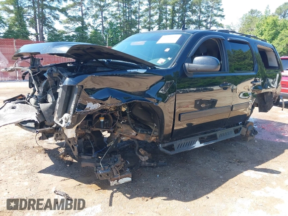 2013 Chevrolet Tahoe LS with VIN 1GNSCAE06DR263469, listed as a IAAI auction lot 42245636 with 240,506 mi miles and . Bid and sale history available at DreamBid. Image 20.