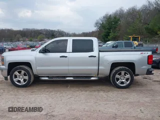 2014 Chevrolet Silverado 1500 LT with VIN 3GCUKREH3EG235137, listed as a IAAI auction lot 42134613 with 191,347 mi miles. Bid and sale history available at carsss.com. Image 14.