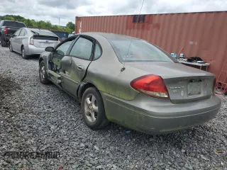 2004 Ford Taurus SE with VIN 1FAFP53274A193186, listed as a Copart auction lot 60255125 with 184,493 mi miles and Salvage title. Bid and sale history available at DreamBid. Image 2.