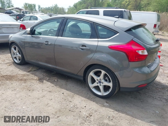 2014 Ford Focus Titanium with VIN 1FADP3N20EL422693, listed as a IAAI auction lot 42060024 with 97,371 mi miles and . Bid and sale history available at DreamBid. Image 3.