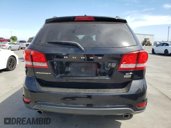 2015 Dodge Journey SXT with VIN 3C4PDCBG6FT743028, listed as a Copart auction lot 63286595 with 148,595 mi miles and Salvage title. Bid and sale history available at DreamBid. Image 6.