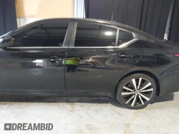 2022 Nissan Altima SR with VIN 1N4BL4CV5NN413823, listed as a IAAI auction lot 41412942 with 30,843 mi miles and . Bid and sale history available at carsss.com. Image 14.