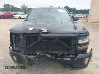 2016 Chevrolet Silverado 1500 LT with VIN 1GCVKREC4GZ113687, listed as a IAAI auction lot 42107434 with 95,577 mi miles and . Bid and sale history available at DreamBid. Image 12.