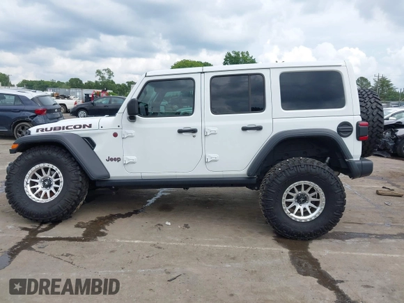 2021 Jeep Wrangler Unlimited Rubicon with VIN 1C4HJXFG7MW527498, listed as a IAAI auction lot 42393520 with 18,085 mi miles and . Bid and sale history available at DreamBid. Image 14.