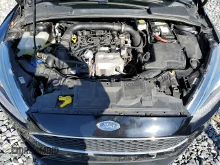 2018 Ford Focus SE with VIN 1FADP3FE9JL306394, listed as a Copart auction lot 52902175 with 77,338 mi miles and Salvage title. Bid and sale history available at DreamBid. Image 11.