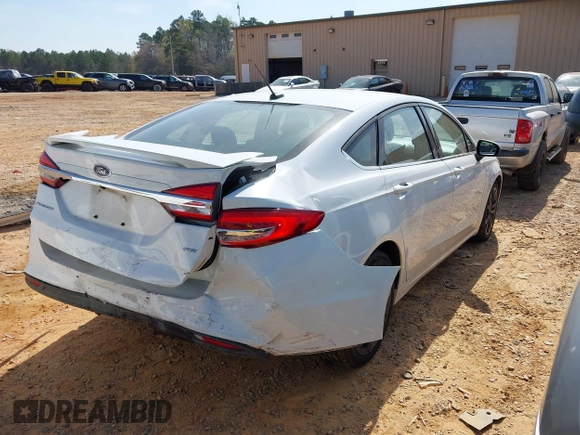 2018 Ford Fusion SE with VIN 3FA6P0H76JR227014, listed as a IAAI auction lot 41901203 with 147,454 mi miles and . Bid and sale history available at DreamBid. Image 4.