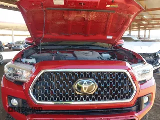 2018 Toyota Tacoma SR with VIN 3TMCZ5AN8JM141486, listed as a IAAI auction lot 42142145 with 54,851 mi miles and . Bid and sale history available at DreamBid. Image 10.