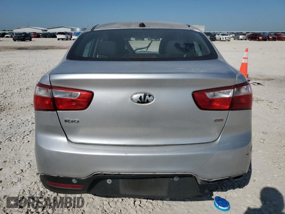 2014 Kia Rio LX with VIN KNADM4A30E6329515, listed as a Copart auction lot 52415295 with 231,991 mi miles and Salvage Title. Bid and sale history available at DreamBid. Image 6.