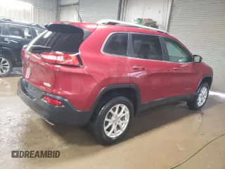 2015 Jeep Cherokee Latitude with VIN 1C4PJMCS5FW624799, listed as a Copart auction lot 52339795 with 142,681 mi miles and Salvage Title. Bid and sale history available at DreamBid. Image 3.