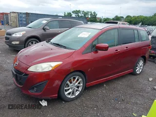 2012 Mazda 5 Grand Touring with VIN JM1CW2DLXC0134997, listed as a IAAI auction lot 42360574 with 230,951 mi miles and . Bid and sale history available at DreamBid. Image 12.