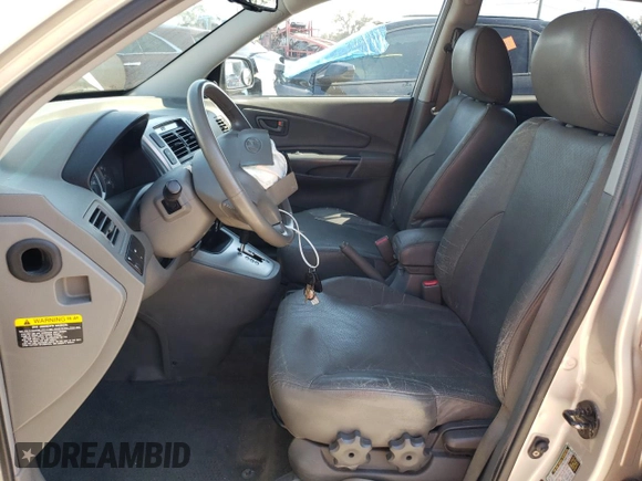 2006 Hyundai Tucson GLS with VIN KM8JN12DX6U393837, listed as a Copart auction lot 75961954 with 215,906 mi miles and Salvage Title. Bid and sale history available at carsss.com. Image 7.