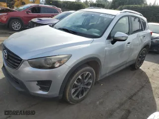 2016 Mazda CX-5 Grand Touring with VIN JM3KE2DYXG0762016, listed as a Copart auction lot 42625515 with 82,951 mi miles and Salvage Title. Bid and sale history available at carsss.com. Image 1.
