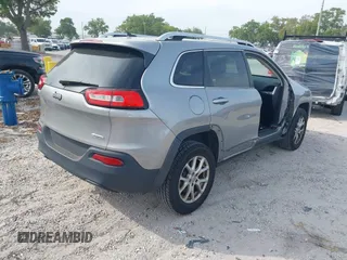 2014 Jeep Cherokee Altitude with VIN 1C4PJMCB4EW107556, listed as a IAAI auction lot 41881448 with 212,816 mi miles and . Bid and sale history available at carsss.com. Image 4.