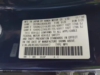 2007 Honda CR-V EX with VIN JHLRE38527C020417, listed as a IAAI auction lot 41964093 with 214,037 mi miles. Bid and sale history available at carsss.com. Image 9.