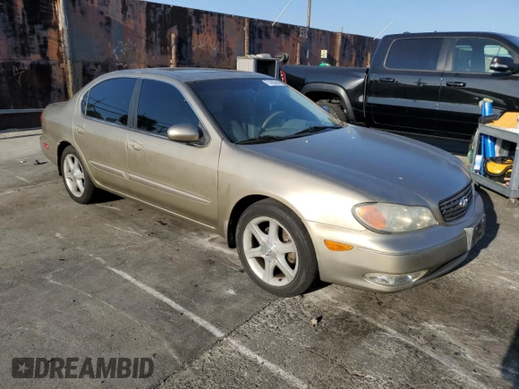 2002 Infiniti I35 Luxury z VIN JNKDA31A12T025612, wystawiony jako Copart lot #71493464 z przebiegiem 80 210 mil mil oraz Szkody całkowita. Historia ofert i sprzedaży dostępna na DreamBid. Obrazek 4.