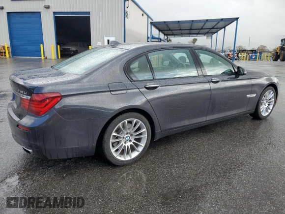 2015 BMW 7 Series 740Li with VIN WBAYE4C52FD947509, listed as a Copart auction lot 49269705 with 80,111 mi miles and Salvage Title. Bid and sale history available at DreamBid. Image 3.