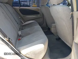 2000 Toyota Corolla VE with VIN 1NXBR12E5YZ369711, listed as a IAAI auction lot 42550174 with 273,785 mi miles and . Bid and sale history available at DreamBid. Image 8.