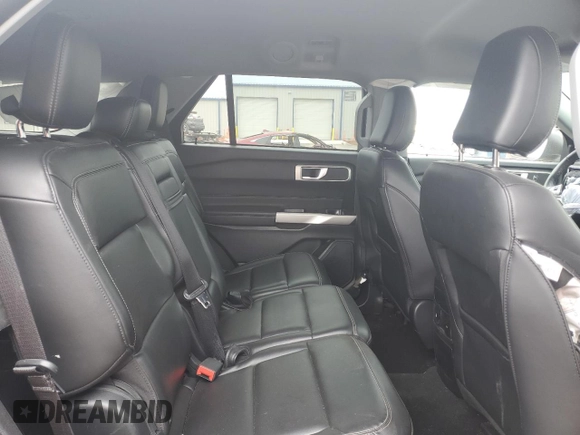 2023 Ford Explorer XLT with VIN 1FMSK8DH3PGA58229, listed as a Copart auction lot 58571525 with 64,536 mi miles and Salvage title. Bid and sale history available at DreamBid. Image 11.