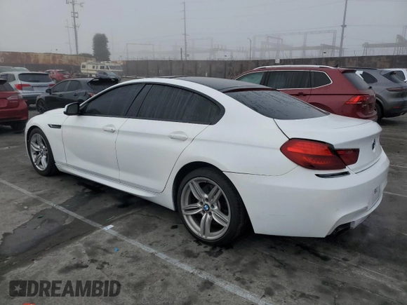 2014 BMW 6 Series 650i z VIN WBA6B2C59ED128936, wystawiony jako Copart lot #46409685 z przebiegiem 53 208 mil mil oraz Szkoda całkowita • Salvage title. Historia ofert i sprzedaży dostępna na DreamBid. Obrazek 2.