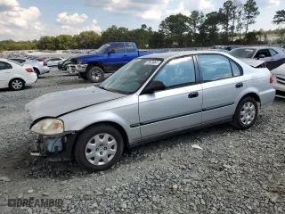 1999 Honda Civic DX with VIN 1HGEJ662XXL027828, listed as a Copart auction lot 72623664 with 133,302 mi miles and Salvage Title. Bid and sale history available at carsss.com. Image 1.