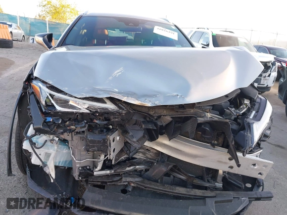 2021 Lexus UX with VIN JTHE9JBHXM2041524, listed as a IAAI auction lot 41826191 with 39,705 mi miles. Bid and sale history available at carsss.com. Image 12.
