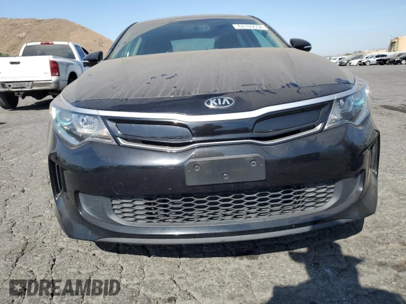 2018 Kia Optima Hybrid Premium with VIN KNAGT4LE1J5020795, listed as a Copart auction lot 64109534 with 112,941 mi miles and Salvage Title. Bid and sale history available at carsss.com. Image 2.