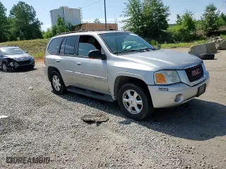 2004 GMC Envoy SLT with VIN 1GKDS13S942193519, listed as a Copart auction lot 84952984 with 156,599 mi miles and Salvage Title. Bid and sale history available at carsss.com. Image 10.