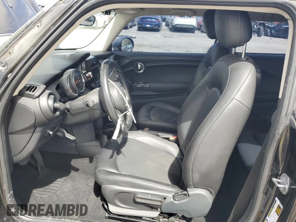 2019 MINI Hardtop Cooper with VIN WMWXP5C5XK2H29936, listed as a Copart auction lot 56713285 with 80,303 mi miles and Salvage title. Bid and sale history available at DreamBid. Image 7.