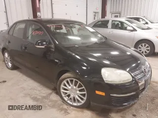 2008 Volkswagen Jetta z VIN 3VWRA71K58M183060, wystawiony jako IAAI lot #41700707 z przebiegiem 174 555 mil mil oraz . Historia ofert i sprzedaży dostępna na DreamBid. Obrazek 1.