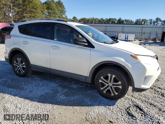 2016 Toyota RAV4 LE with VIN JTMZFREV2GJ077312, listed as a Copart auction lot 88358125 with 126,428 mi miles and Salvage Title. Bid and sale history available at carsss.com. Image 4.