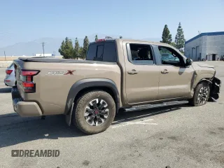 2022 Nissan Frontier Pro-X z VIN 1N6ED1EJ7NN616562, wystawiony jako Copart lot #62711855 z przebiegiem 19 579 mil mil oraz Szkoda całkowita • Salvage title. Historia ofert i sprzedaży dostępna na DreamBid. Obrazek 3.