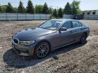 2021 BMW 3 Series 330i xDrive with VIN WBA5R7C00MFK50404, listed as a Copart auction lot 56010064 with 22,905 mi miles. Bid and sale history available at carsss.com. Image 1.