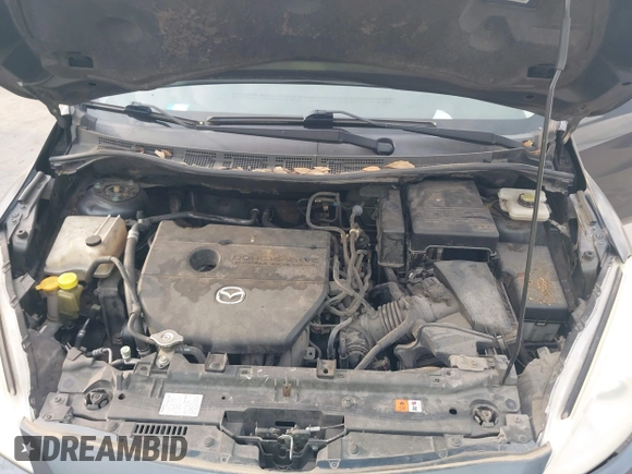 2012 Mazda 5 Sport with VIN JM1CW2BL6C0134921, listed as a IAAI auction lot 42290476 with 128,490 mi miles and . Bid and sale history available at DreamBid. Image 10.