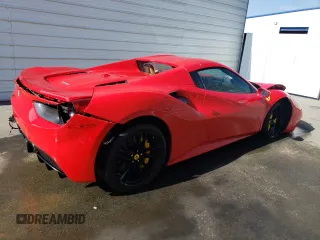2018 Ferrari 488 z VIN ZFF80AMA1J0229687, wystawiony jako Copart lot #58090934 z przebiegiem Nie podano mil oraz Szkody całkowita. Historia ofert i sprzedaży dostępna na DreamBid. Obrazek 3.