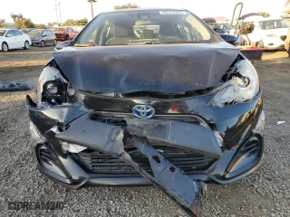 2017 Toyota Prius c One with VIN JTDKDTB33H1594451, listed as a Copart auction lot 86323264 with 87,681 mi miles and Salvage Title. Bid and sale history available at carsss.com. Image 5.