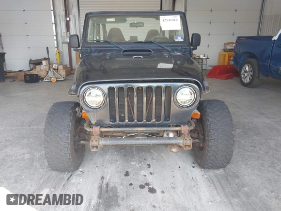 1999 Jeep Wrangler Sport with VIN 1J4FY19S4XP494405, listed as a IAAI auction lot 42542416 with 168,856 mi miles and . Bid and sale history available at DreamBid. Image 6.