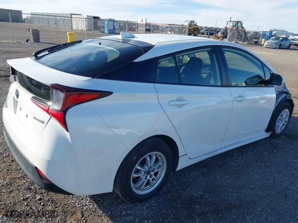2021 Toyota Prius L Eco with VIN JTDKAMFU9M3150667, listed as a IAAI auction lot 41609328 with 59,177 mi miles. Bid and sale history available at carsss.com. Image 4.