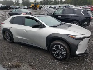 2024 Toyota bZ4X XLE with VIN JTMABACA3RA065053, listed as a Copart auction lot 72720414 with 4,406 mi miles and Salvage Title. Bid and sale history available at carsss.com. Image 4.