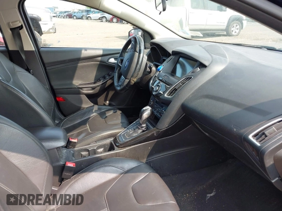 2016 Ford Focus Titanium with VIN 1FADP3N26GL206866, listed as a IAAI auction lot 42403015 with 95,753 mi miles and . Bid and sale history available at DreamBid. Image 5.