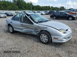 2000 Pontiac Sunfire SE z VIN 1G2JB5249Y7115960, wystawiony jako Copart lot #65038974 z przebiegiem 112 487 mil mil oraz Szkody całkowita. Historia ofert i sprzedaży dostępna na DreamBid. Obrazek 4.