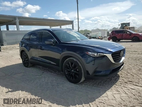 2022 Mazda CX-9 Touring Plus with VIN JM3TCBAYXN0607056, listed as a Copart auction lot 61740065 with 59,281 mi miles and Salvage title. Bid and sale history available at DreamBid. Image 15.