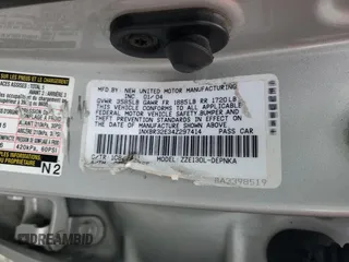 2004 Toyota Corolla CE with VIN 1NXBR32E34Z297414, listed as a Copart auction lot 52541105 with 147,072 mi miles and Salvage Title. Bid and sale history available at DreamBid. Image 12.